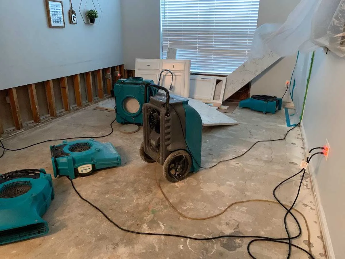 Dehumidifier in flood-cut room for Water Damage Restoration in Boonton
